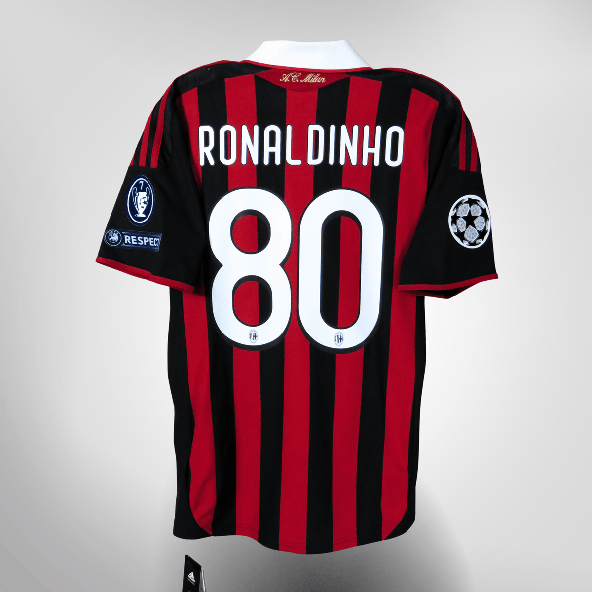 Vintage AC Milan 2009-2010 Home football shirt with Ronaldinho 80 print, size S, brand new with tags, product code E84210 | Nostalgic Football Shirts