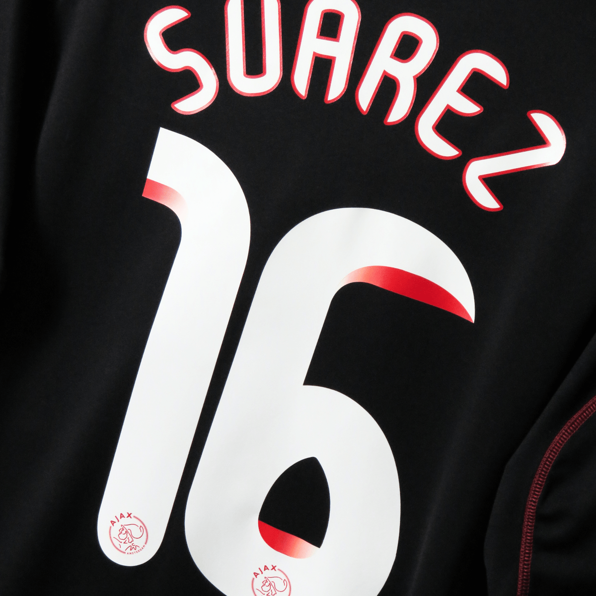 Retro Ajax 2009-2010 Away football jersey by Adidas, Suarez 16, size M | Nostalgic Football Shirts