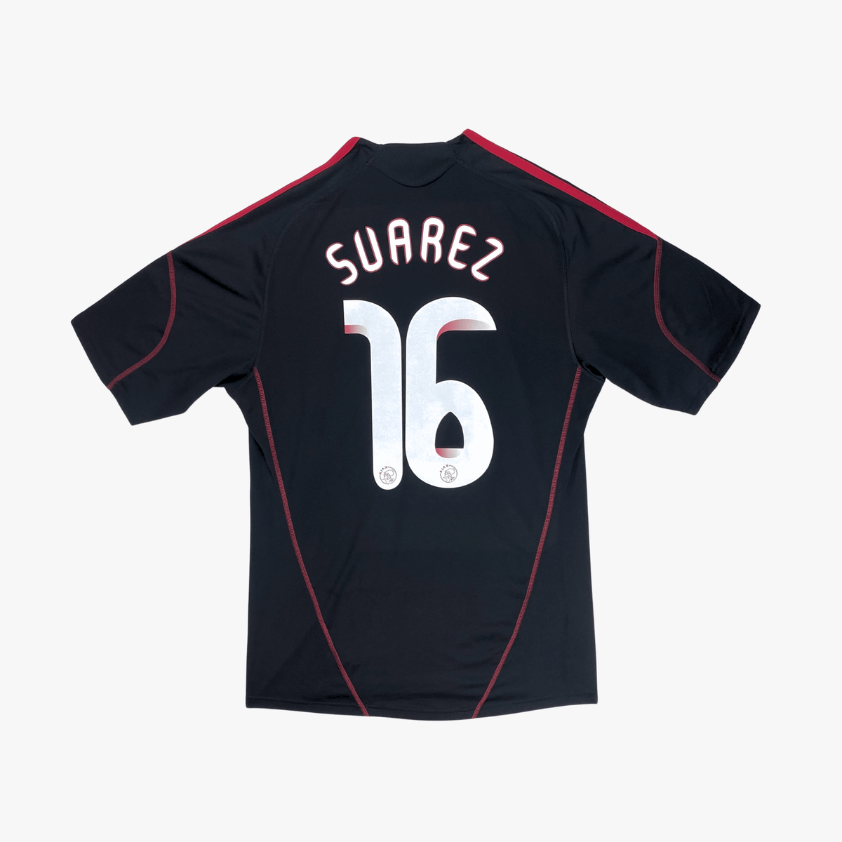 Vintage Ajax 2009-2010 Away football shirt with Suarez 16 print, size M | Nostalgic Football Shirts
