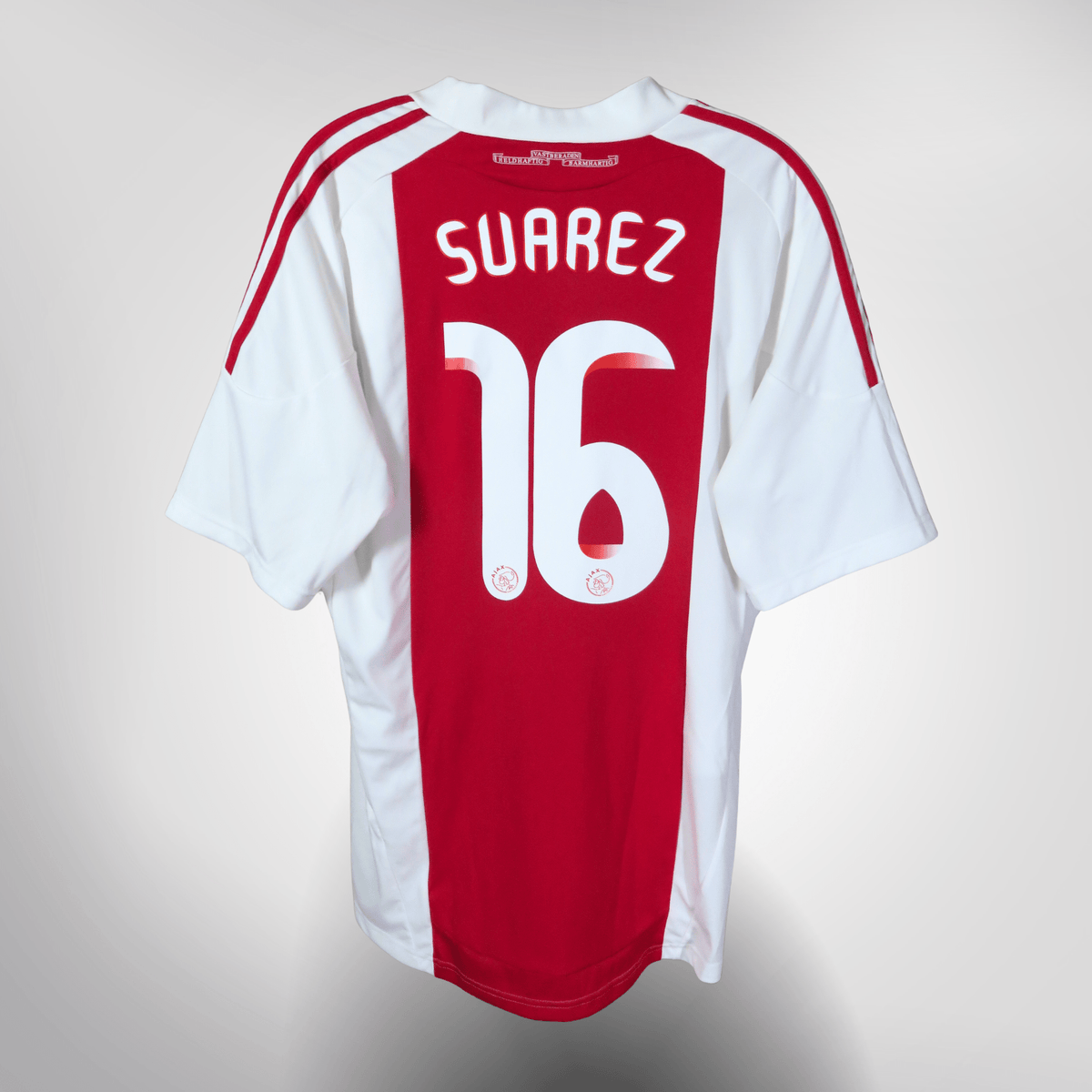 Vintage Ajax 2010-2011 Home football shirt with Suarez 10 print, size L, product code P95929 | Nostalgic Football Shirts