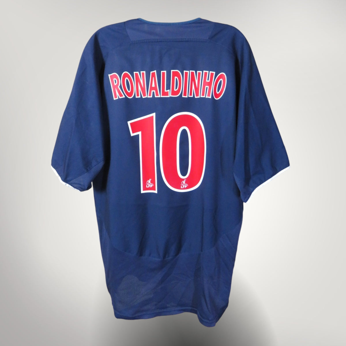 Vintage PSG 2003-2004 Home football shirt with Ronaldinho 10 print, size L, product code 112738 | Nostalgic Football Shirts
