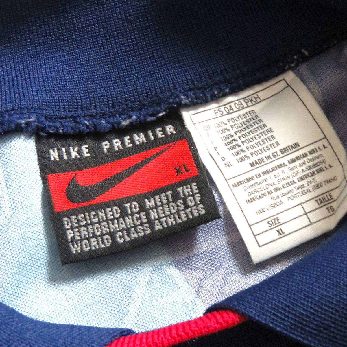 Nostalgic Football Shirts Arsenal 1995-96 uitshirt label met Nike Premier logo en maat XL wasvoorschriften